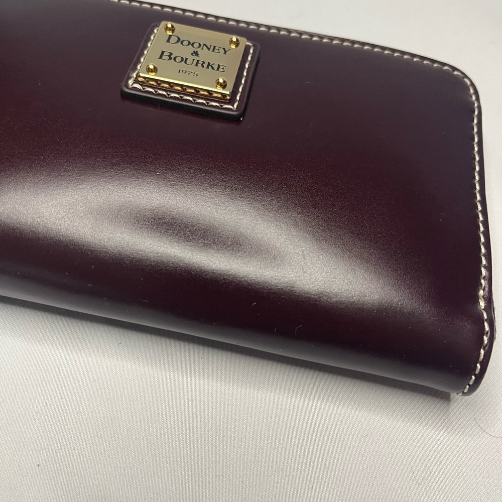 Dooney and Bourke Wexford Leather Zip Around Phone Wristlet Clutch - Bordeaux - Picture 2 of 9